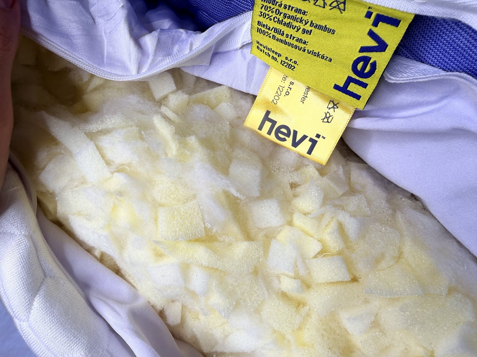 Štítok so zložením obliečky vankúša Hevi Pillow a drvená pamäťová pena